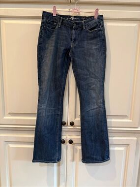Y2K Bootcut Jeans | 7 For All Mankind High-Waist Bootcut Jeans in Dark Wash.